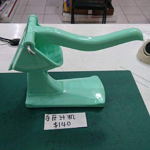 壓汁器